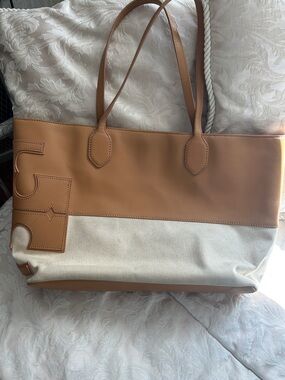 7024. Tory Burch Tan Leather and Cream Canvas Tote.